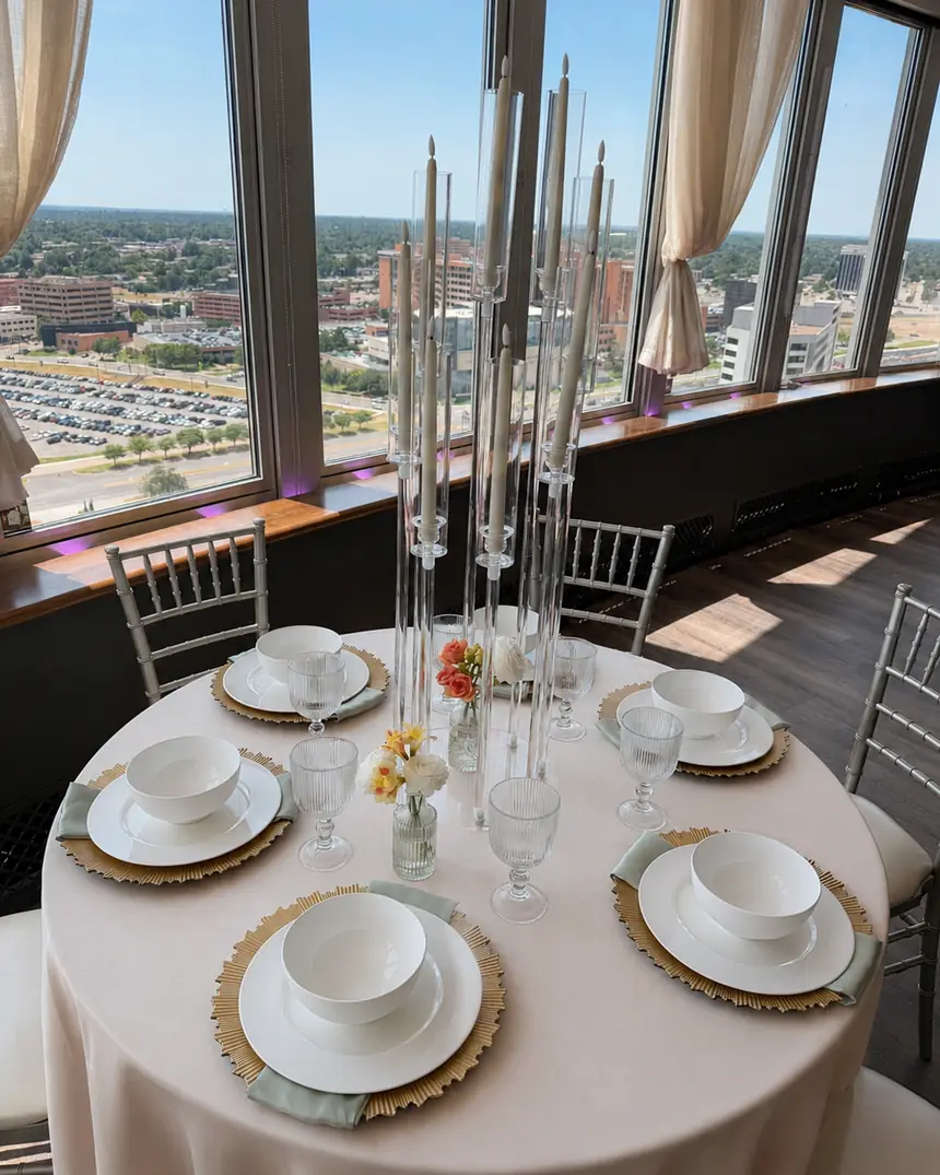 Champagne linen and candelabras over the skyline width=
