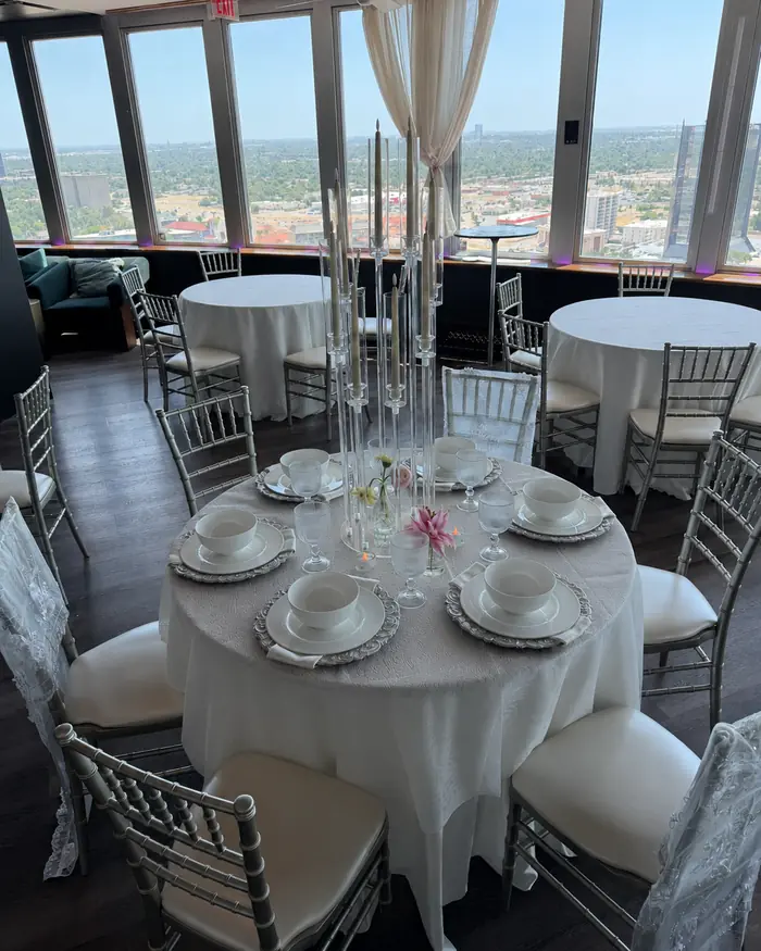 White Lace 120-inch round tablecloth set for six at Founders Tower, Oklahoma City